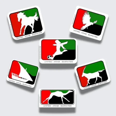 Sticker sheet featuring six UAE-themed silhouettes: horse, falcon, footballer, dhow, camel, and oryx over red, green, and black flag colors.